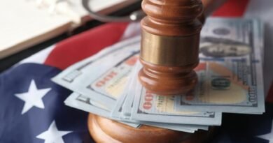 close up of banknotes and a gavel