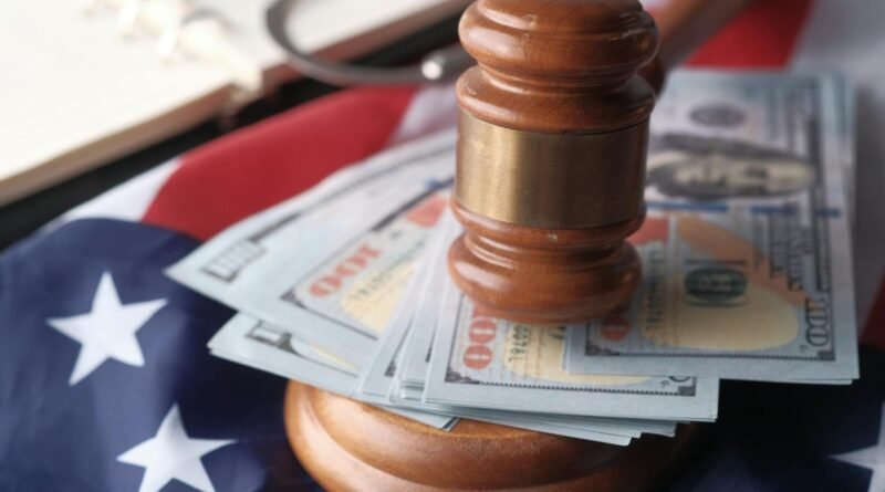 close up of banknotes and a gavel