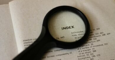 magnifying glass on book