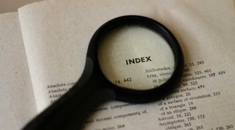 magnifying glass on book